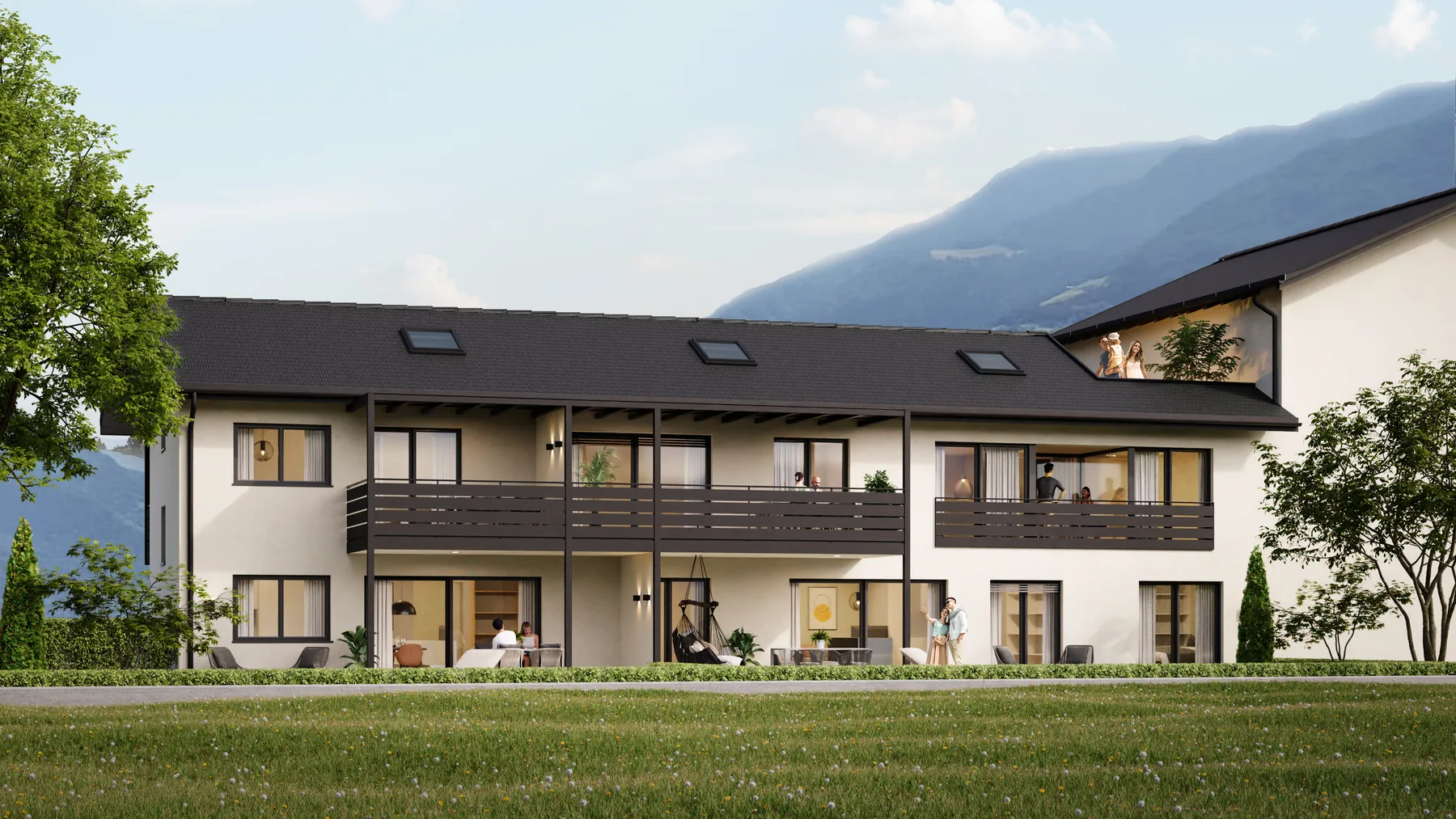 Südansicht von Residence Goldegg mit Balkonen und Garten